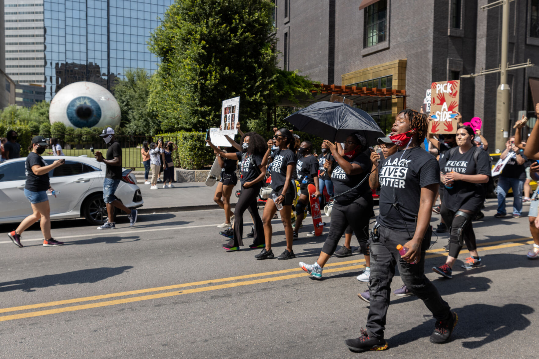 Photos: Protesters march down U.S. 75, chant outside home of Dallas mayor to call for racial justice